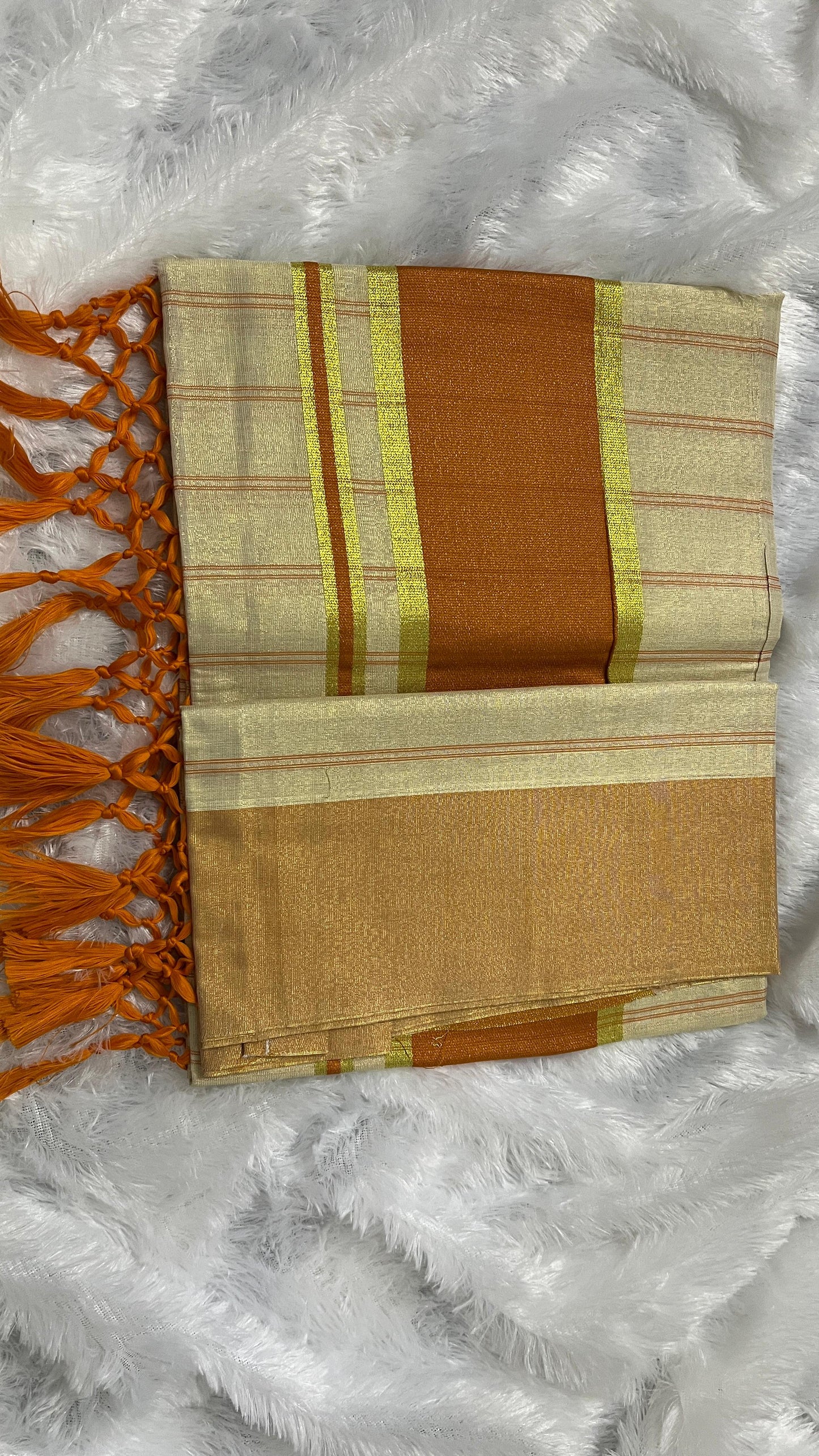 Ratna Charth – Tissue Kerala Saree (Orange Border Edition)