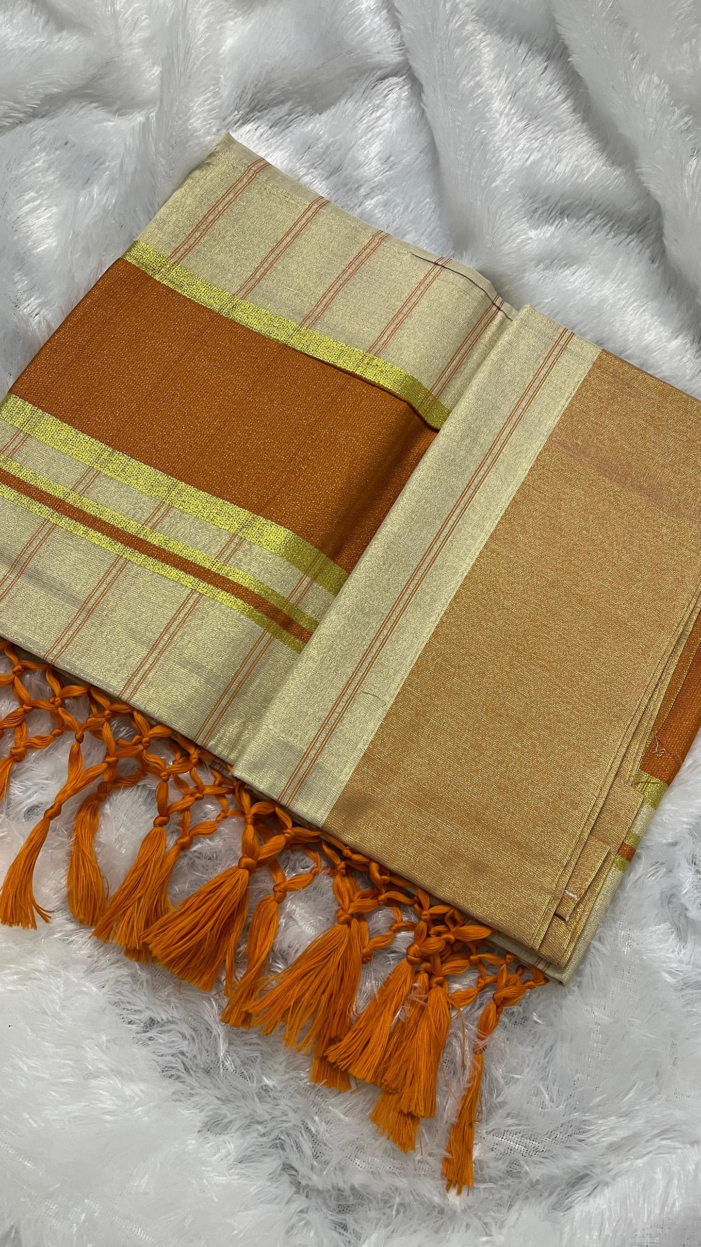 Ratna Charth – Tissue Kerala Saree (Orange Border Edition)