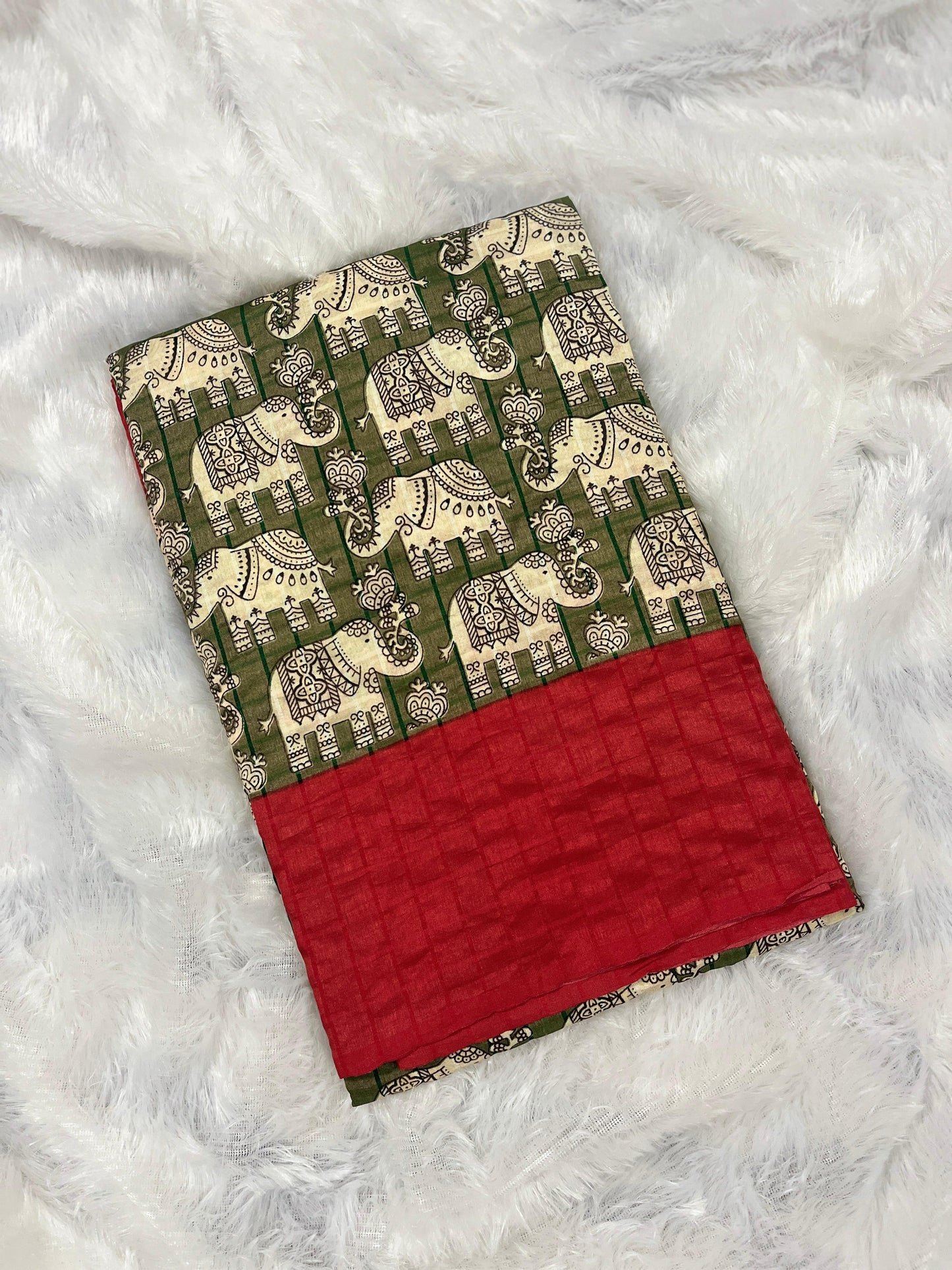 Hasthini – Green Elephant Print Soft Silk Saree with Red Border