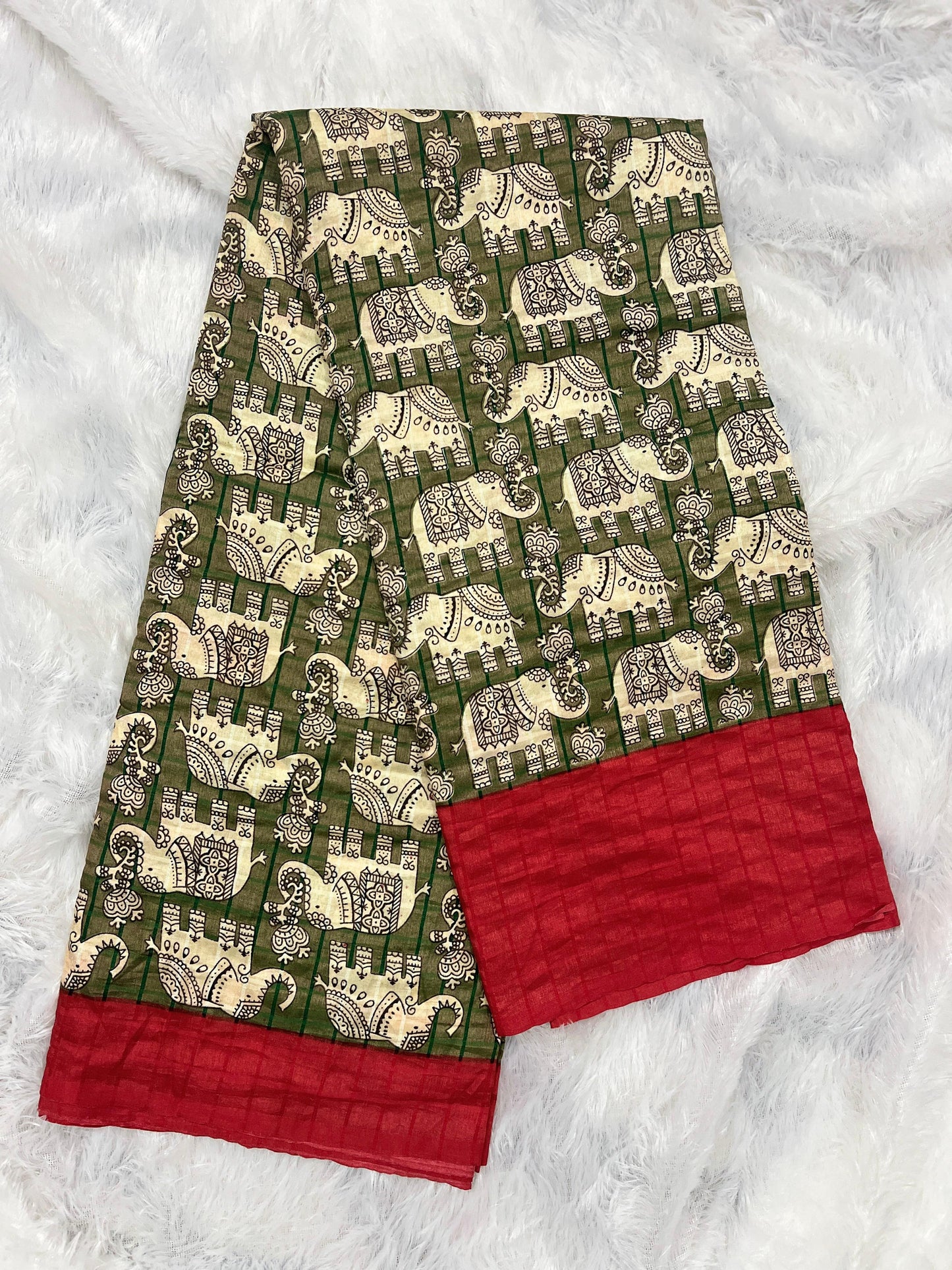 Hasthini – Green Elephant Print Soft Silk Saree with Red Border