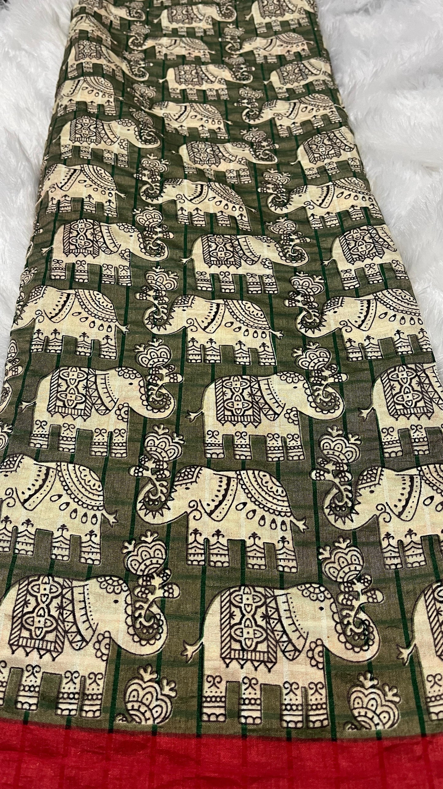 Hasthini – Green Elephant Print Soft Silk Saree with Red Border