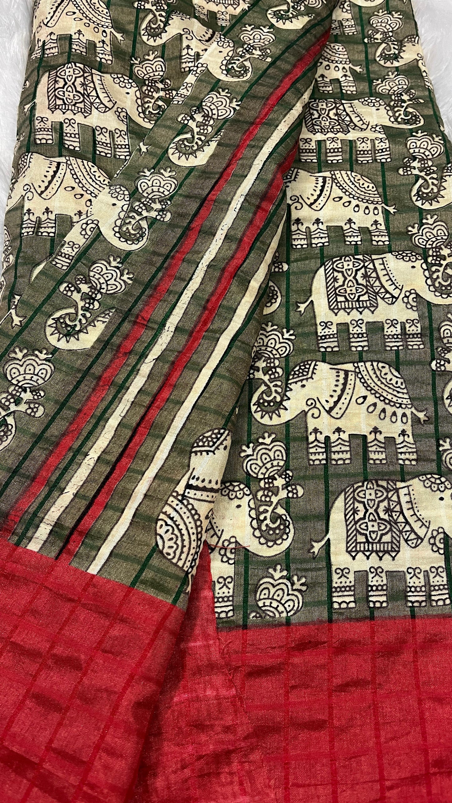 Hasthini – Green Elephant Print Soft Silk Saree with Red Border