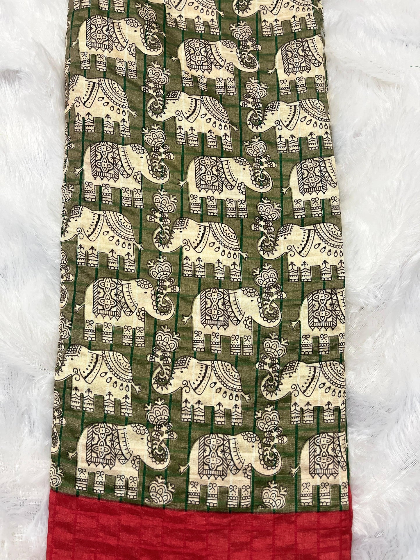 Hasthini – Green Elephant Print Soft Silk Saree with Red Border