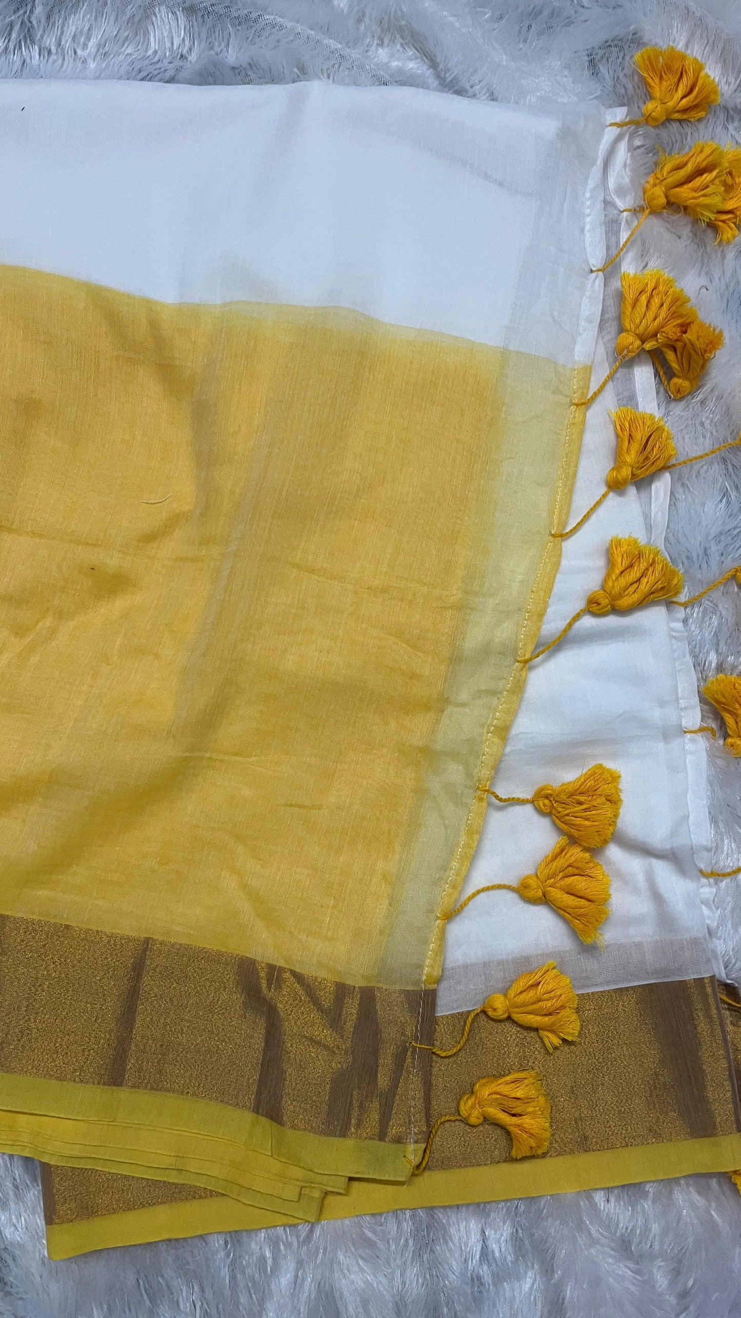 Mul Cotton Yellow-Off White Saree with Kasavu border & Tussels