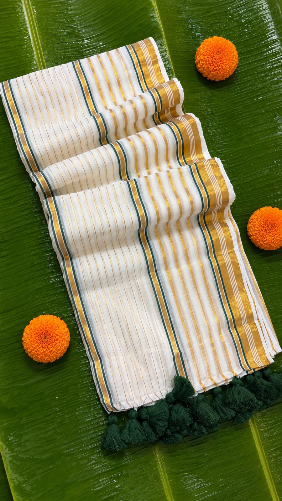 Kasavani – Mul Cotton Saree with Green & Golden Kasavu stripes with tussels
