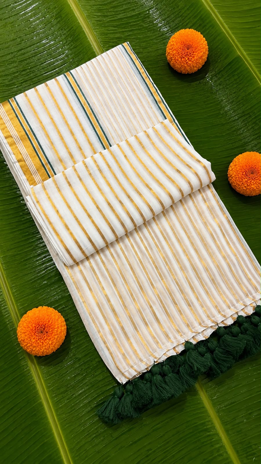 Kasavani – Mul Cotton Saree with Green & Golden Kasavu stripes with tussels