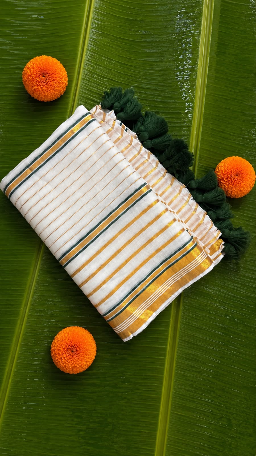 Kasavani – Mul Cotton Saree with Green & Golden Kasavu stripes with tussels