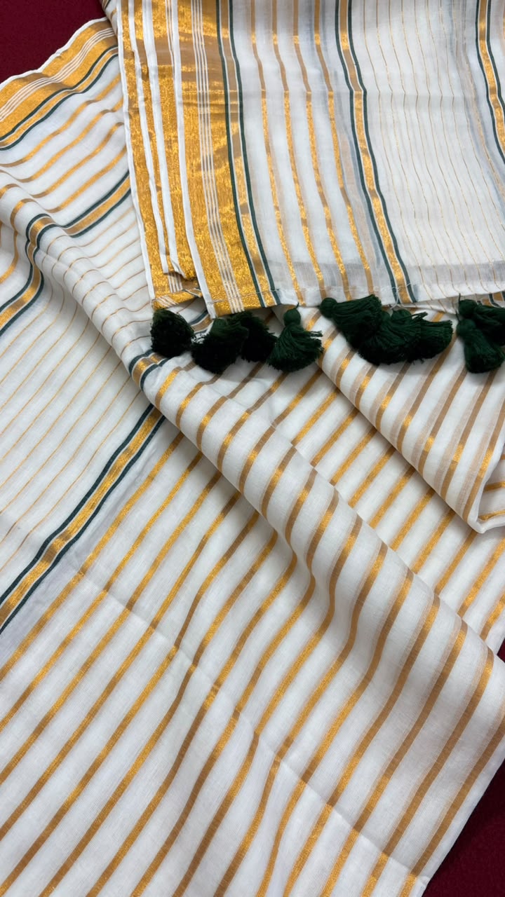 Kasavani – Mul Cotton Saree with Green & Golden Kasavu stripes with tussels