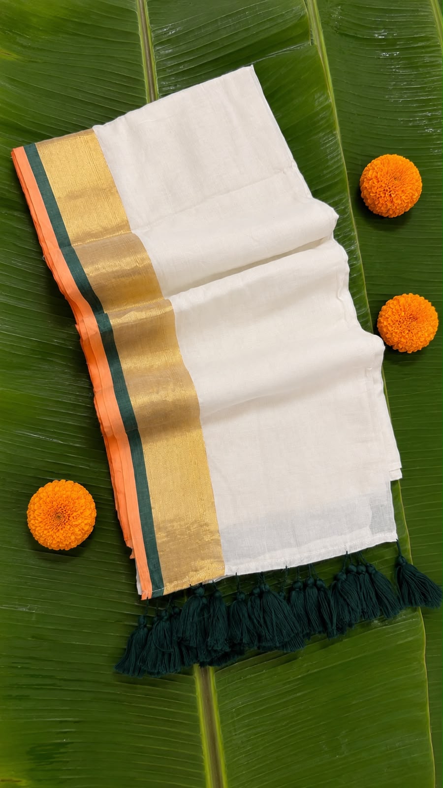Poomkodi – Mul Cotton Saree with Peach, Green & Golden Kasavu Border