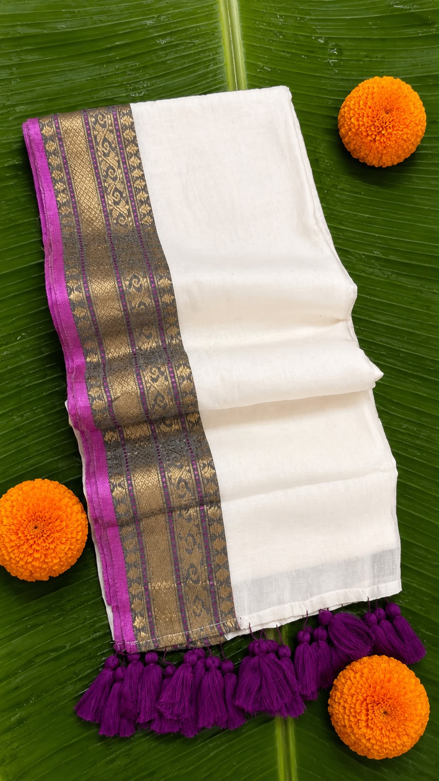 Shalabham – Off-White Mul Cotton Saree with Purple border and Tassels