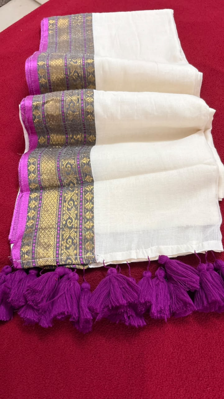 Shalabham – Off-White Mul Cotton Saree with Purple border and Tassels