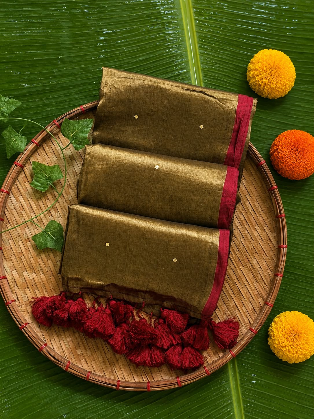 Swarnamukhi – Metallic Gold Tissue Saree with Red Piping & Gini Work