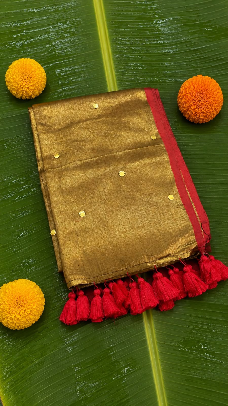 Swarnamukhi – Metallic Gold Tissue Saree with Red Piping & Gini Work