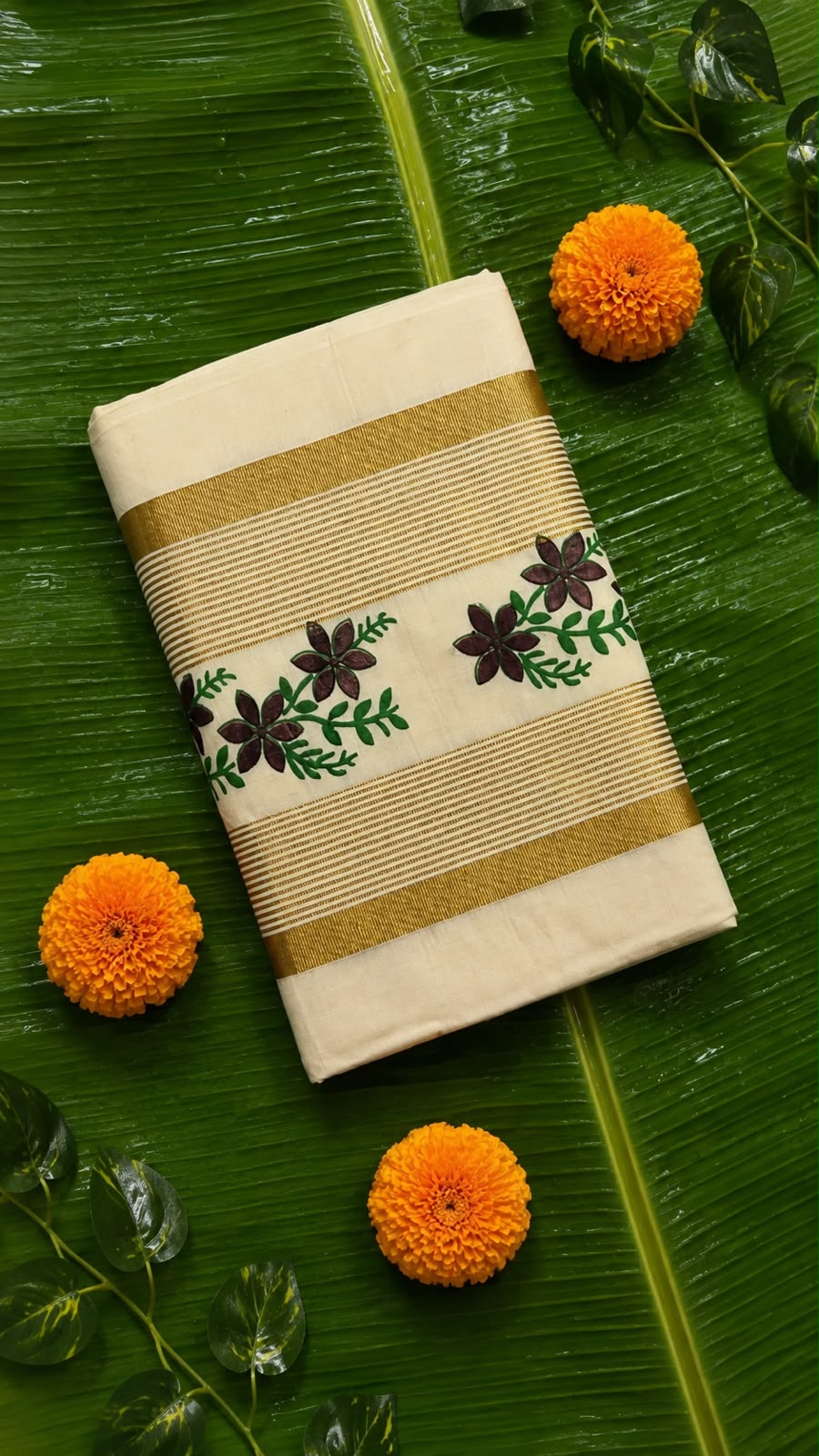 Alliyambal – Brown Lotus Print Kerala Saree